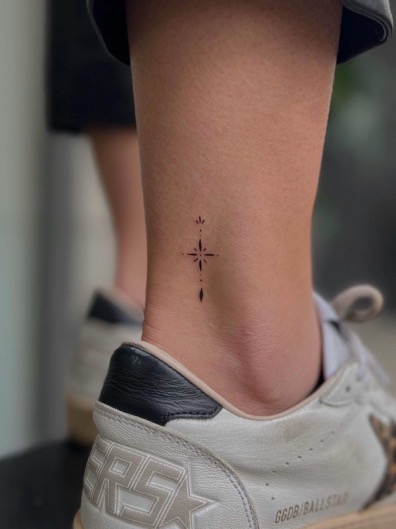 starburst ankle tattoo