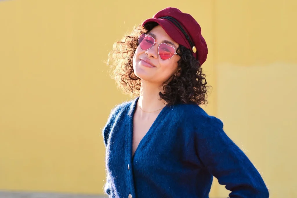 Short Curly Hair With a Newsboy Cap