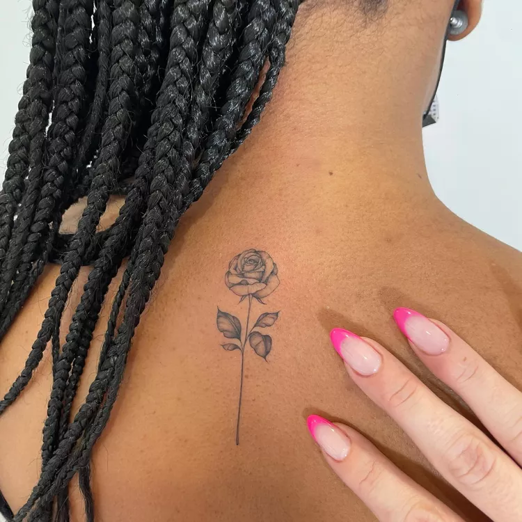 Single Rose Spine Tattoo

