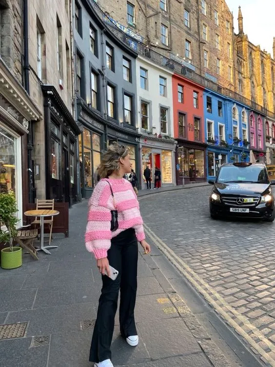 Pink Sweater with Black Pants and White Shoes
