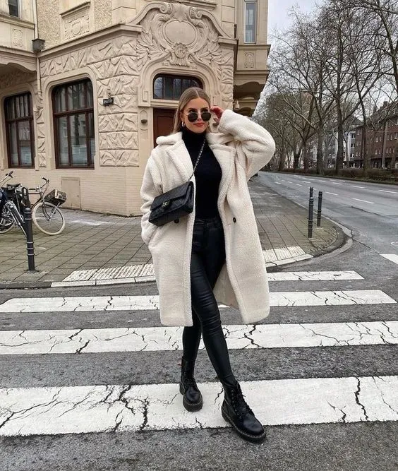 Long White Coat With Black Pants And Turtleneck