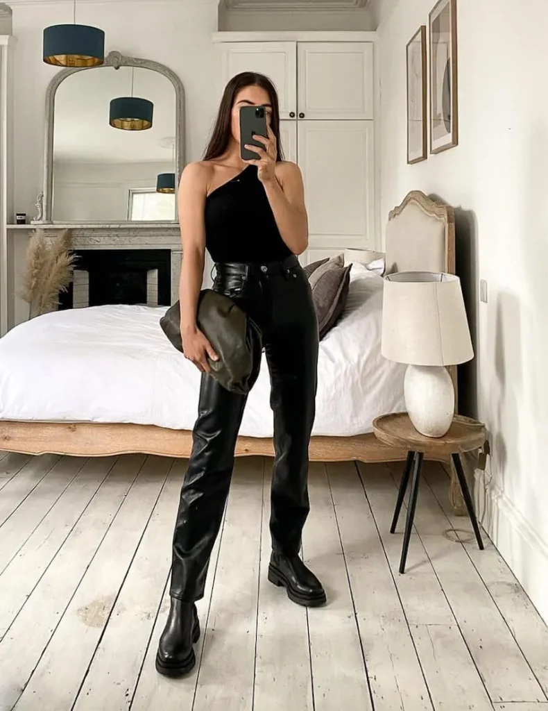 leather pants, asymmetrical top + lug boots