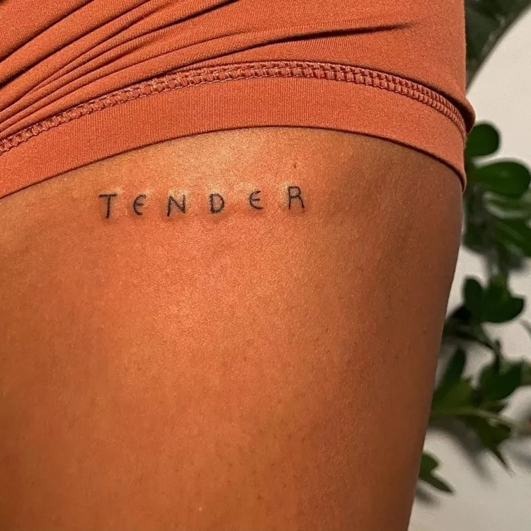 Small Script Thigh Tattoo