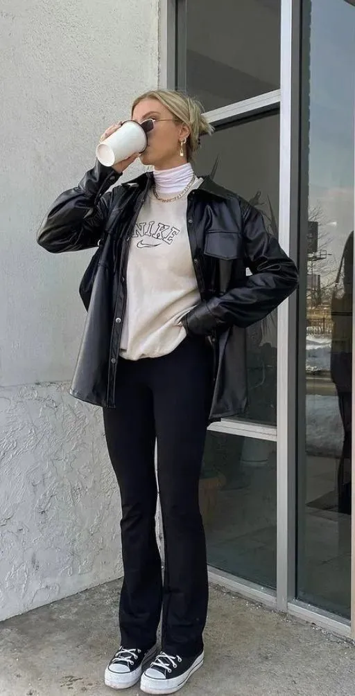 Black Jacket With Beige Sweater and Black Pants