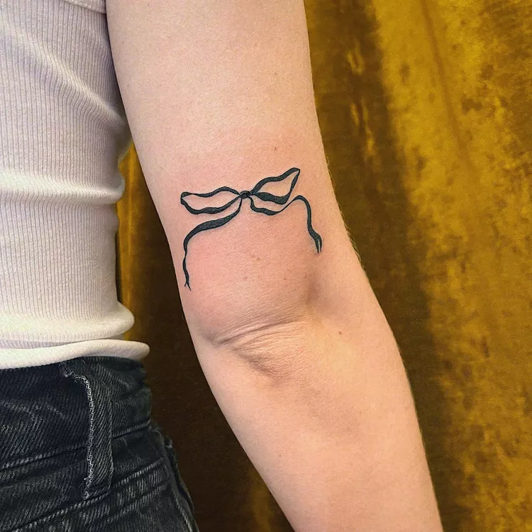 Bow Arm Tattoo