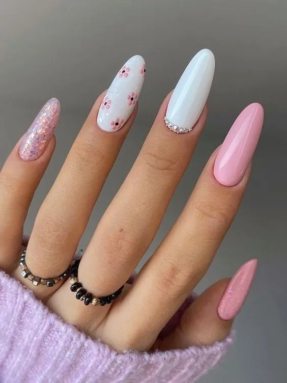 Pink and white nails with glitter