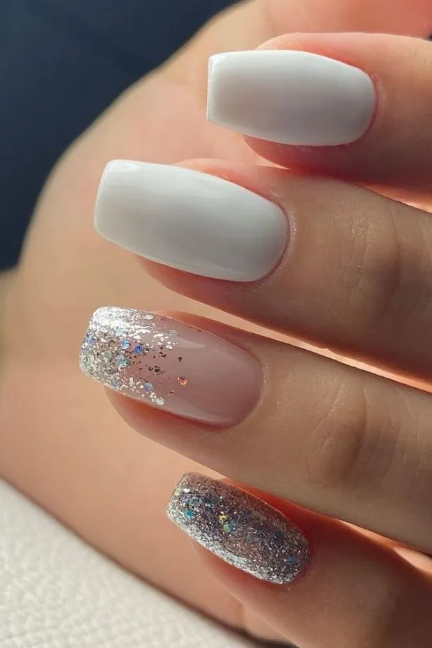 White nails with sparkle short