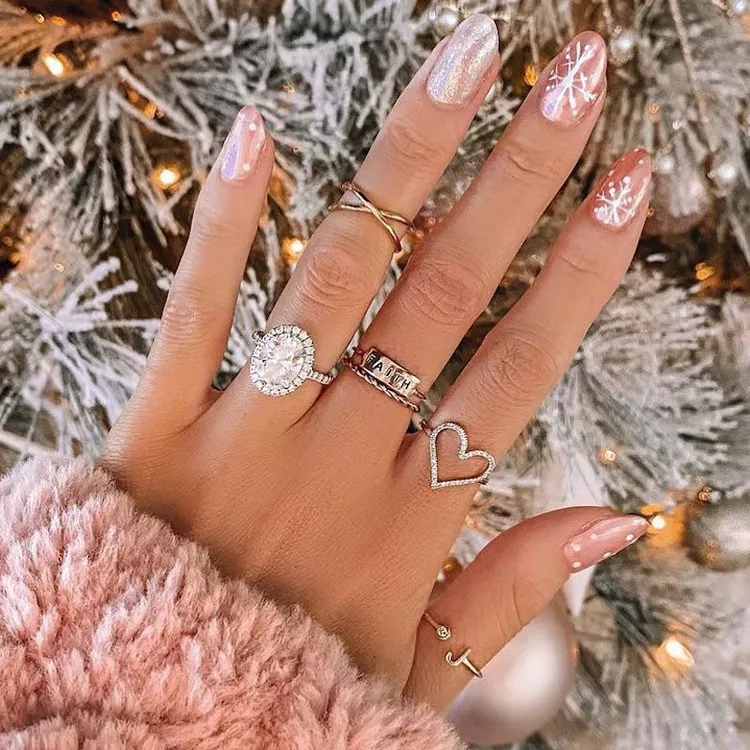 Elegant Rose Gold Snowflake Nail