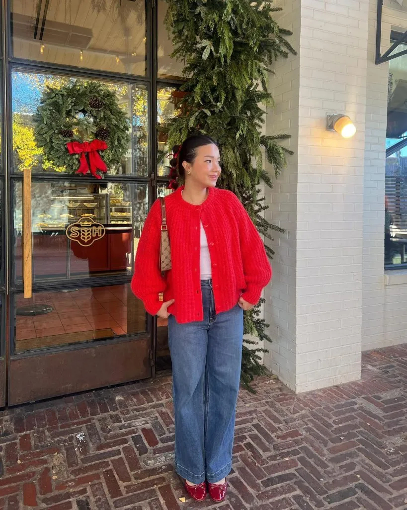 Festive red cardigan with jeans winter